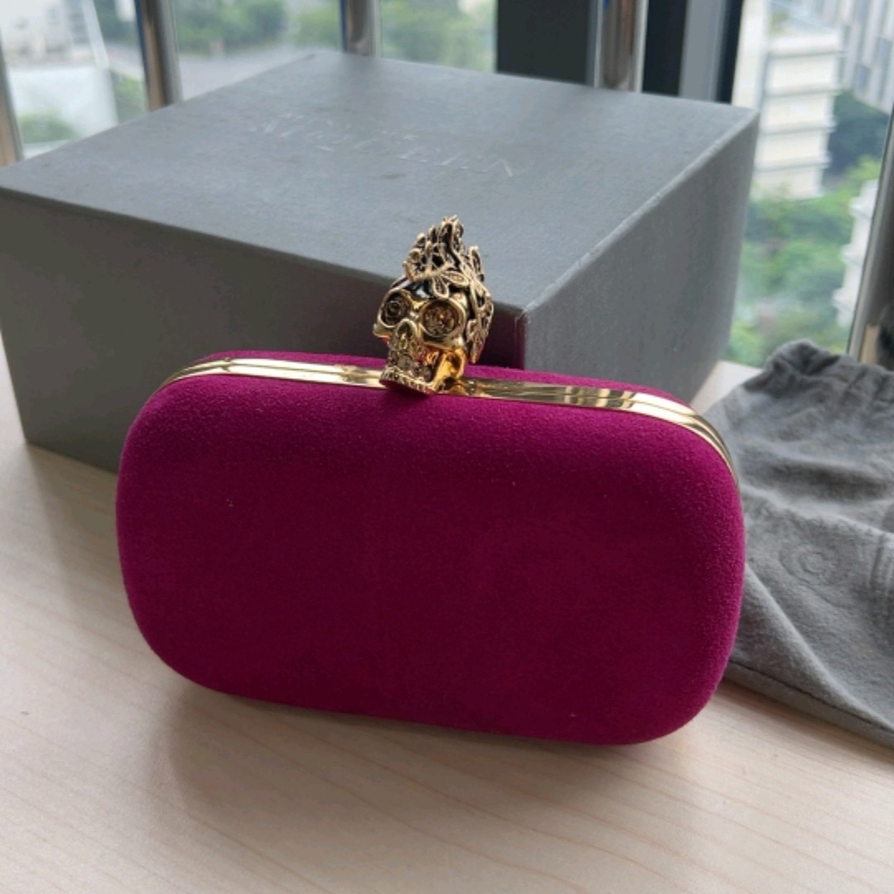 Alexander Mcqueen Elegant Pink Clutch with Gold Skull Accent